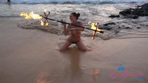 She puts on a show for all at the nude beach